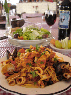 Seafood Pasta, Red Pepper Calamari Appetizer and a selection of red and white wines to complement any meal at Auntie Pasto's.