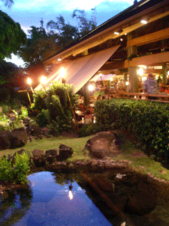 Lush tropial gardens, tiki torches and fresh seafood at Keoki's Paradise Restaurant on Kauai.