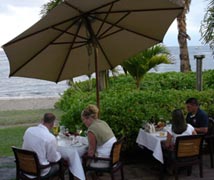 A romantic sunset dinner on the beach at Pacific'O restaurant in Lahaina on Maui.