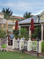 The patio overlooks a grassy square and fountains!