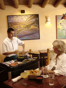 Fresh guacamole made at your table, sizzling chicken fajitas and a Gold margarita in front of the fireplace at Gabriel's.